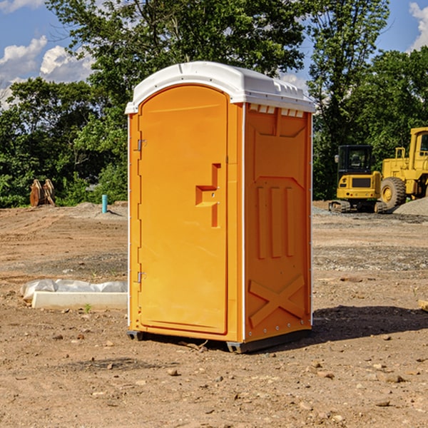 how often are the portable restrooms cleaned and serviced during a rental period in Baker